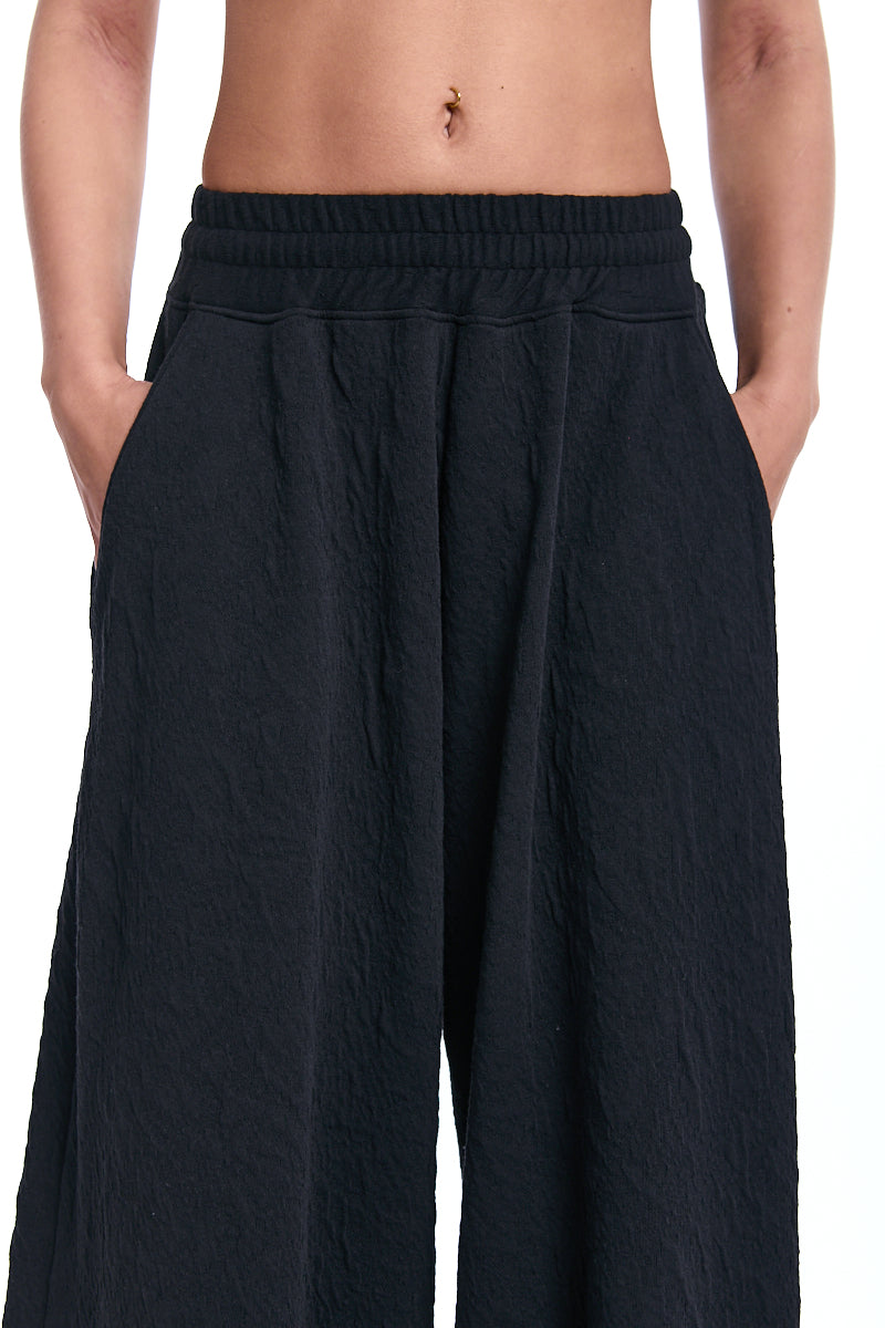 BLACK PALAZZO EMBOSSED FLEECE TROUSERS
