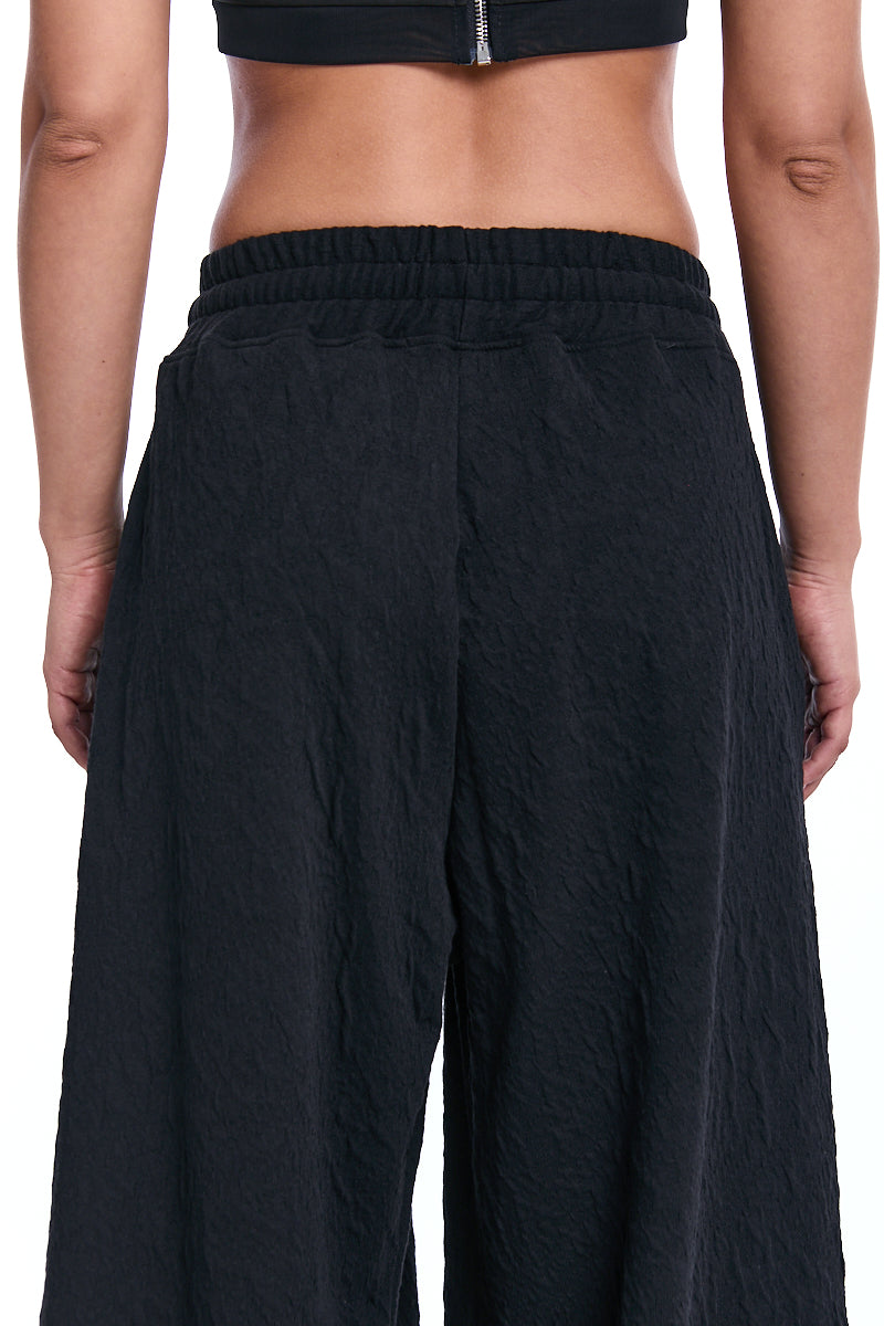 BLACK PALAZZO EMBOSSED FLEECE TROUSERS