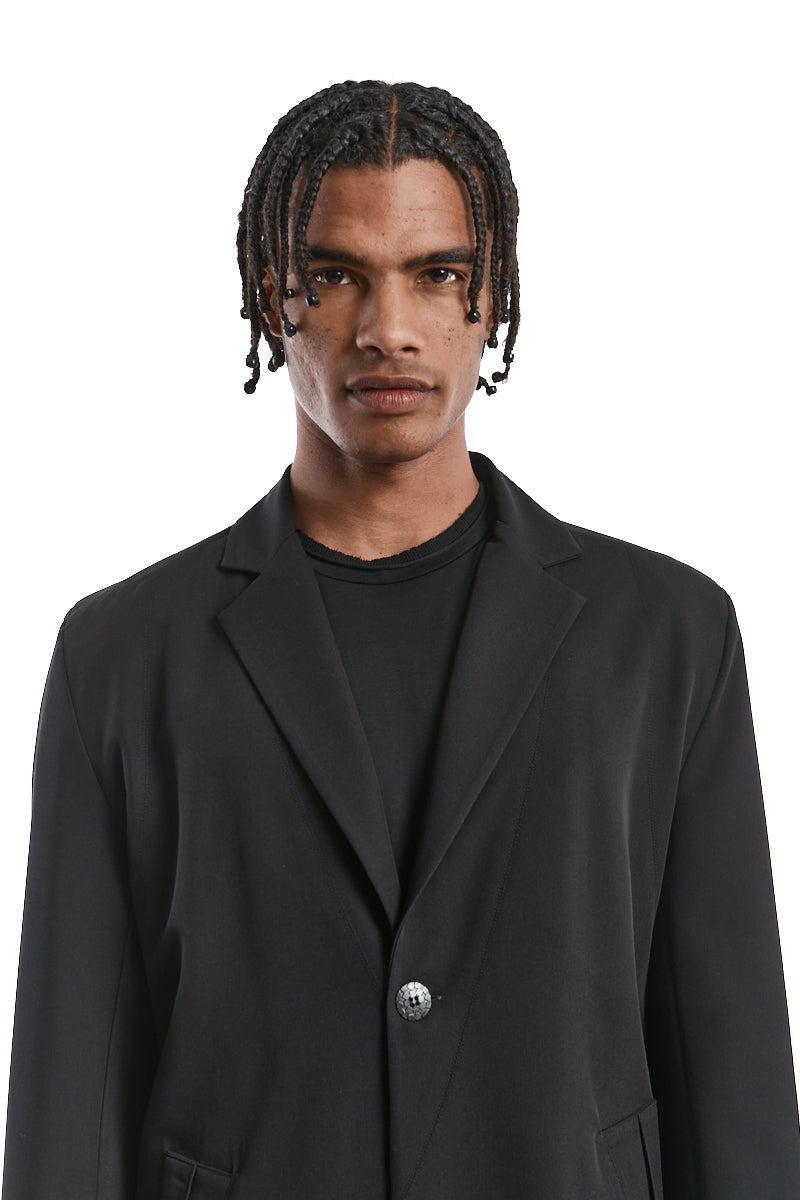 ASYMMETRIC FLUID-STRETCH JACKET