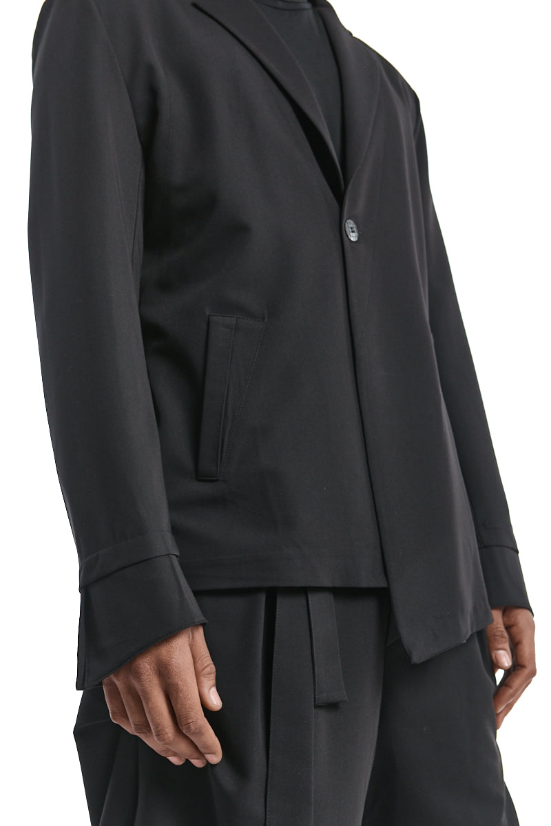 ASYMMETRIC FLUID-STRETCH JACKET