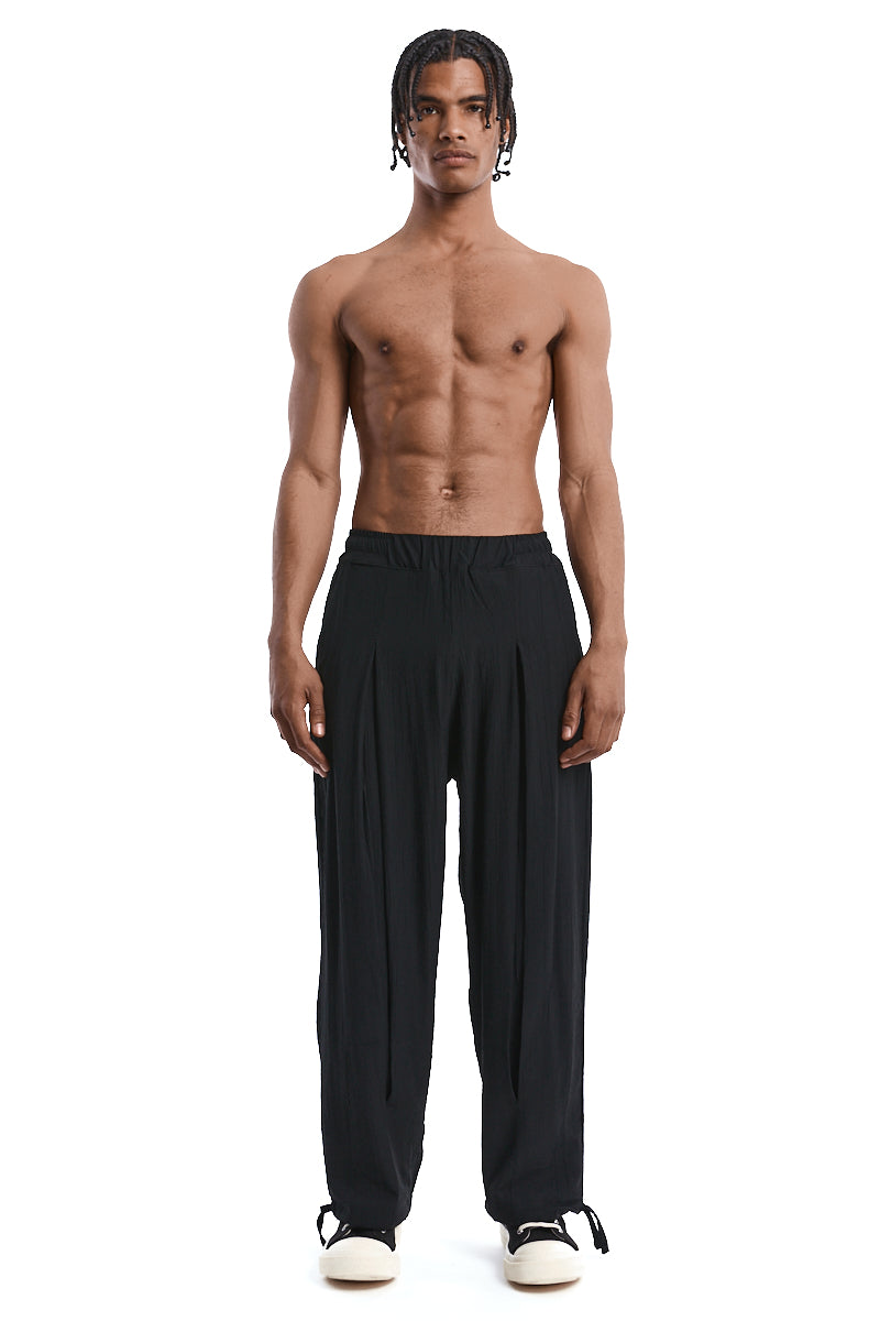 BLACK OVER PLEATED PANTS