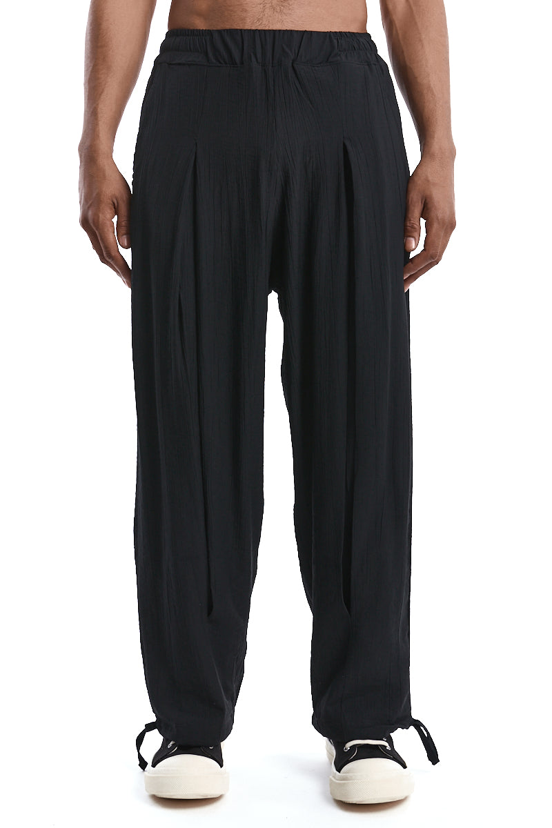 BLACK OVER PLEATED PANTS