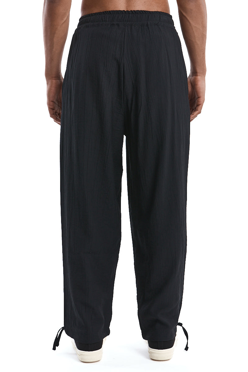 BLACK OVER PLEATED PANTS