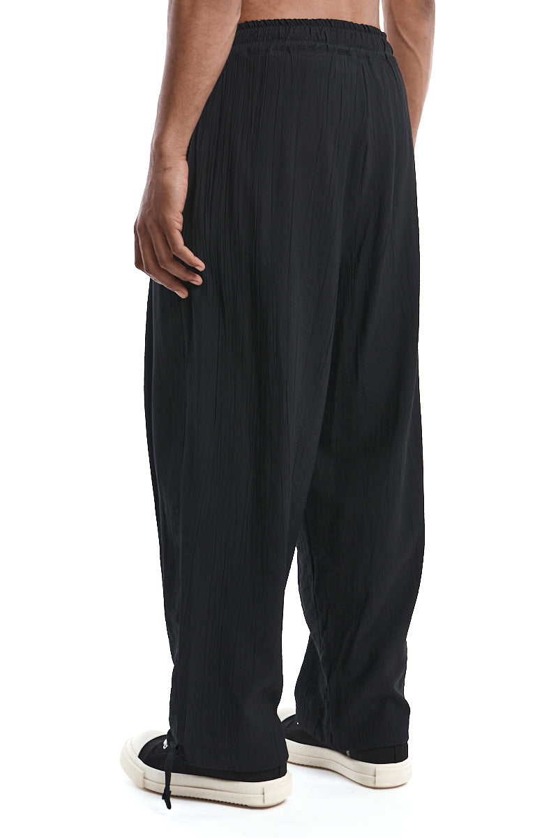 BLACK OVER PLEATED PANTS