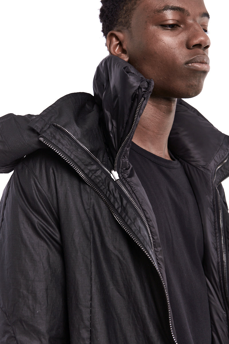 MASNADA | Shop Online | AW24 | Long Waxed Padded Parka MASNADA | Shop Online | AW24 | Long Waxed Padded Parka