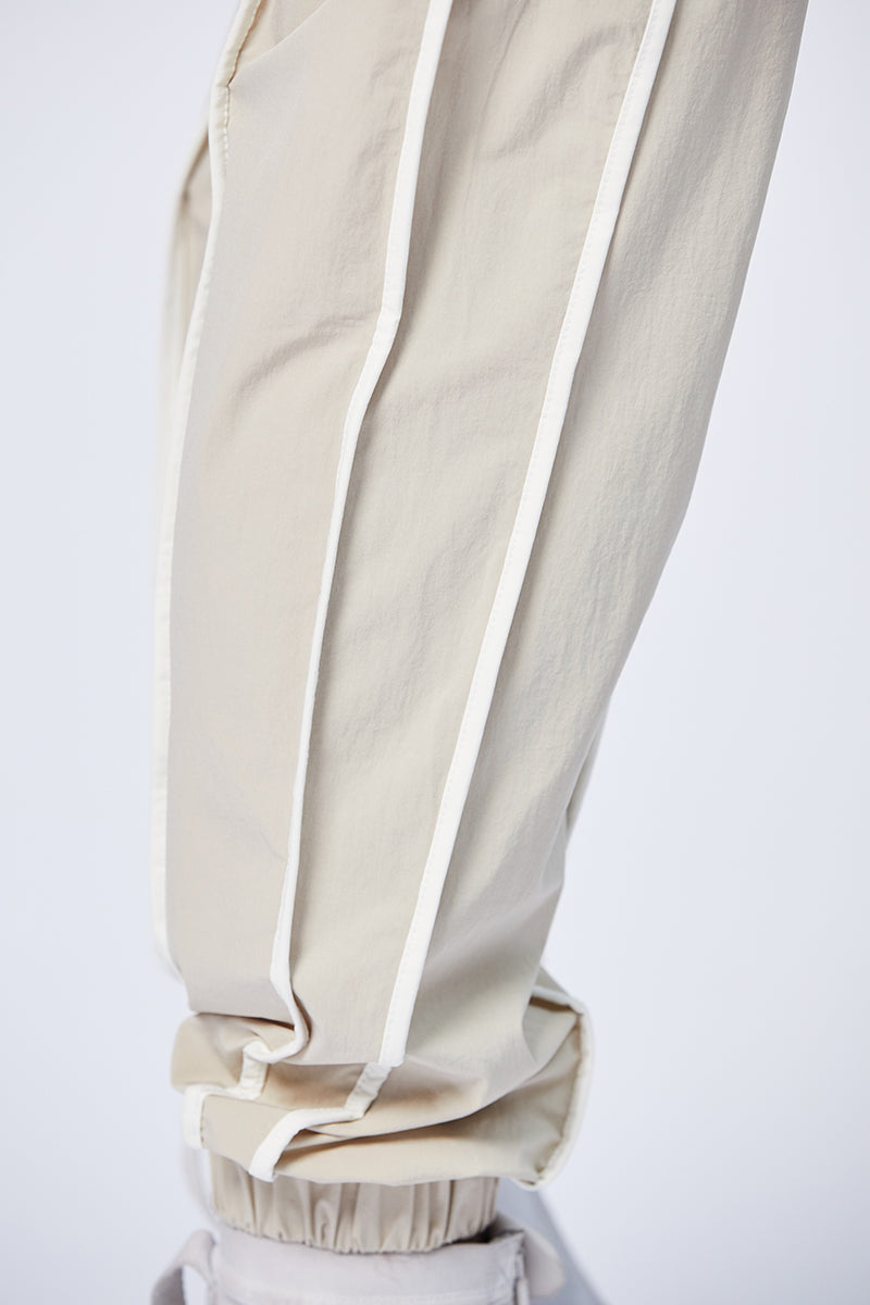 SAND CONTRAST PIPINGS PANTS