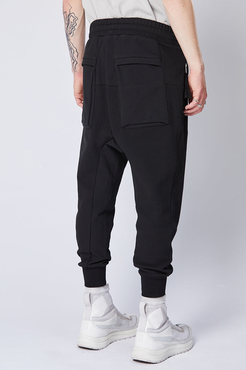 BLACK TEXTURED DROP CROTCH TROUSERS